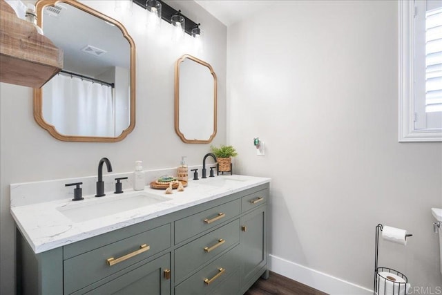 46525 Peach Tree St, Temecula, CA 92592 - bathroom with double vanity and wood finished floors
