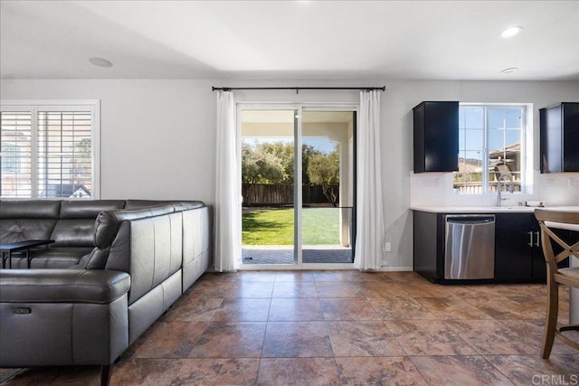 46525 Peach Tree St, Temecula, CA 92592 - living room featuring stone finish floors and baseboards