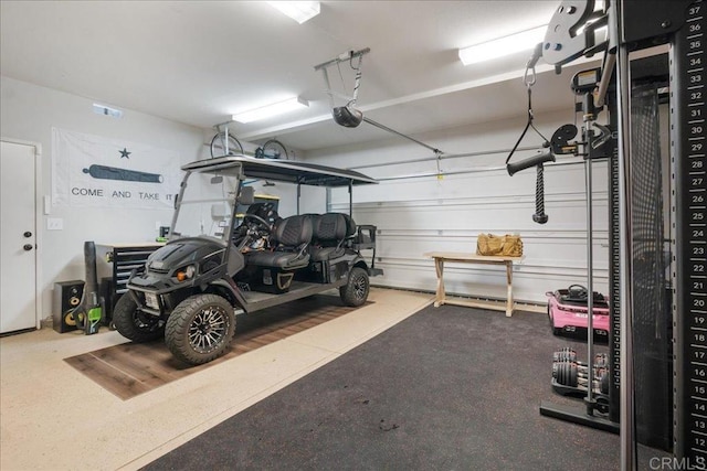 46525 Peach Tree St, Temecula, CA 92592 - garage featuring a garage door opener