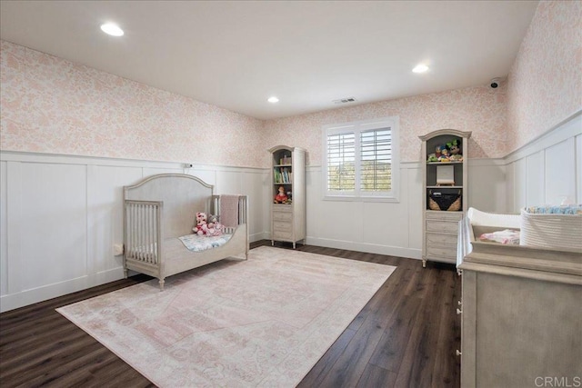 46525 Peach Tree St, Temecula, CA 92592 - bedroom with wallpapered walls, a wainscoted wall, a decorative wall, dark wood finished floors, and recessed lighting