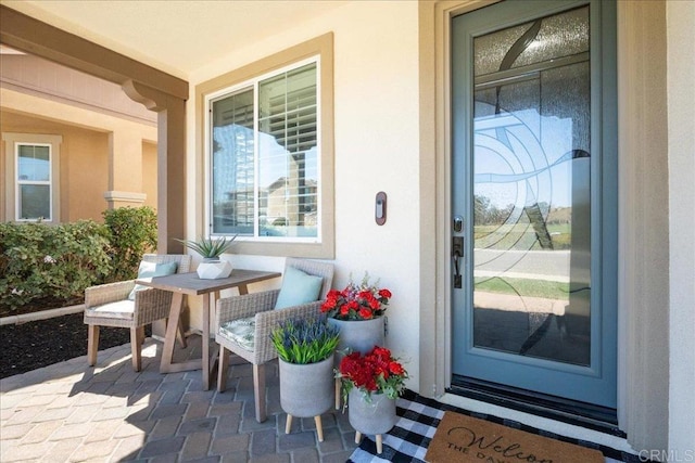 46525 Peach Tree St, Temecula, CA 92592 - entrance to property featuring covered porch and stucco siding