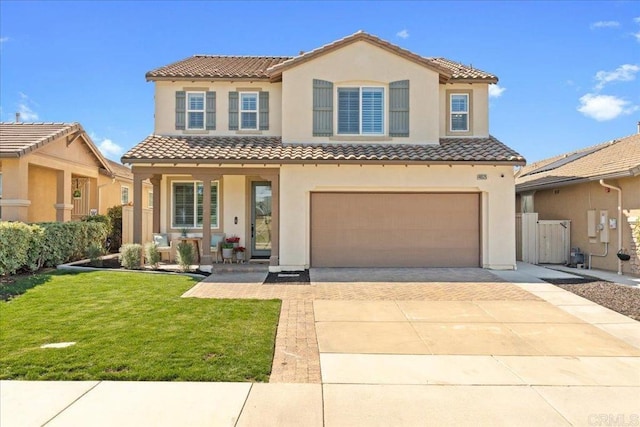 46525 Peach Tree St, Temecula, CA 92592 - mediterranean / spanish-style house with a tiled roof, stucco siding, a garage, and driveway