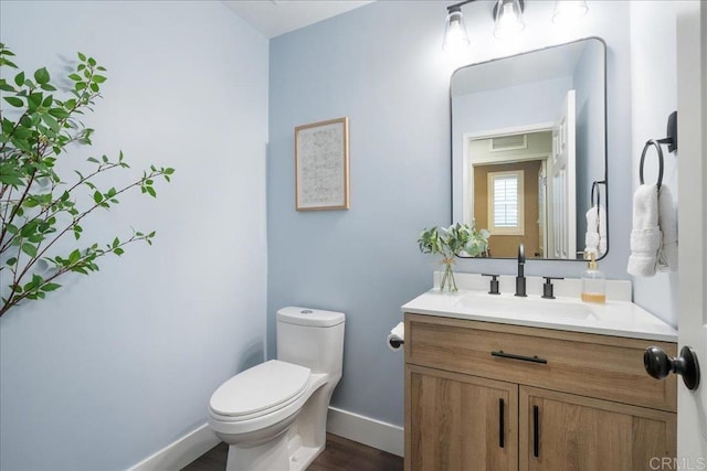46525 Peach Tree St, Temecula, CA 92592 - half bathroom with vanity and wood finished floors