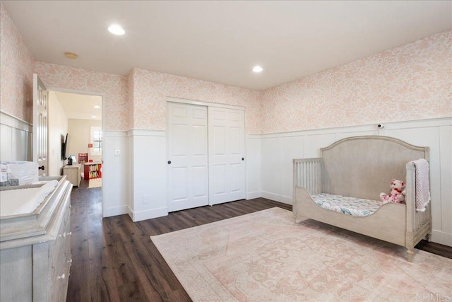 46525 Peach Tree St, Temecula, CA 92592 - bedroom featuring wallpapered walls, a wainscoted wall, dark wood-style flooring, recessed lighting, and a closet