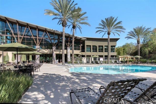pool featuring a patio area