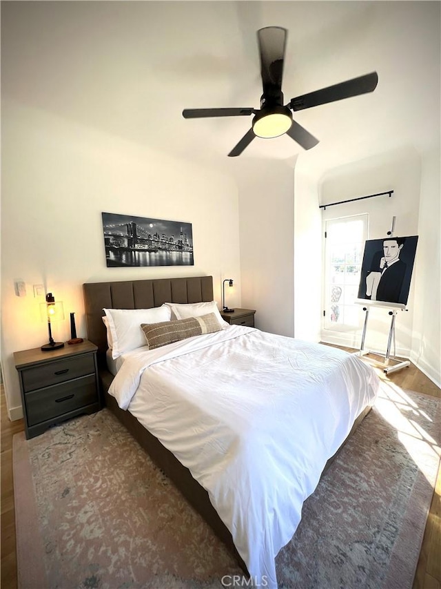 bedroom with wood finished floors and ceiling fan