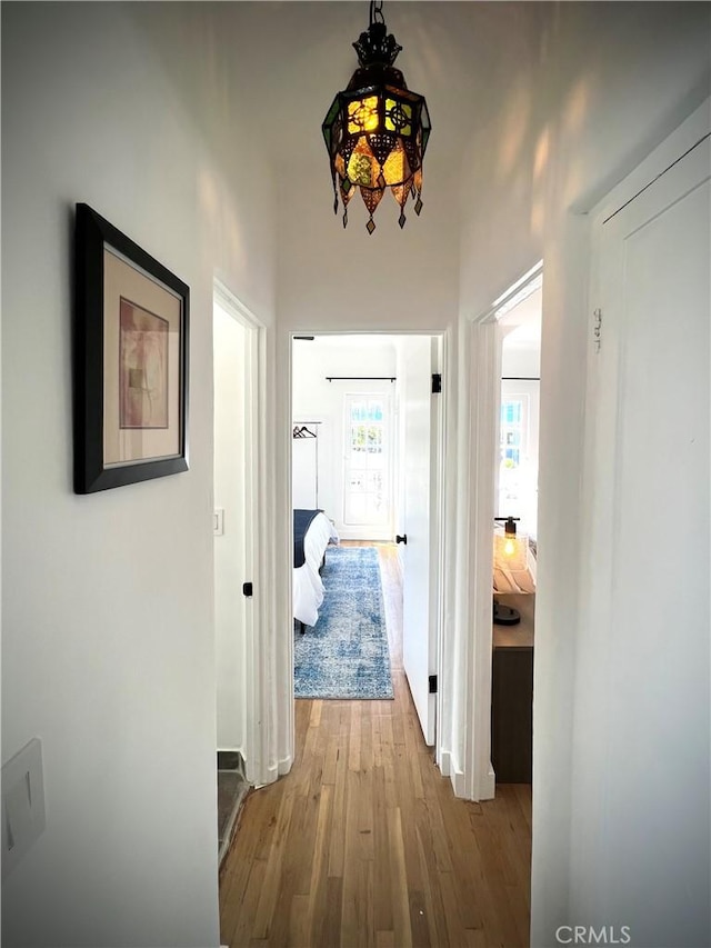 corridor with wood finished floors