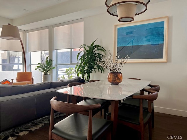 1245 N New Hampshire Ave Unit 4, Los Angeles, CA 90029 - dining room featuring dark wood-type flooring and baseboards