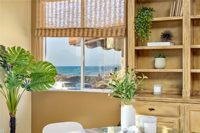 sitting room featuring a water view