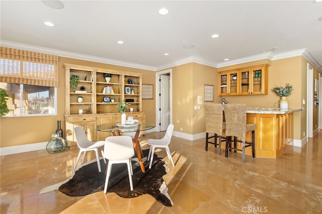 dining area featuring marble finish floor, baseboards, wet bar, and recessed lighting
