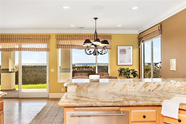 kitchen featuring recessed lighting, crown molding, light stone counters, and a notable chandelier