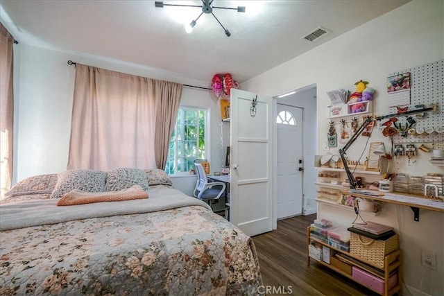 201 E Olive St, San Bernardino, CA 92410 - bedroom featuring visible vents and dark wood-type flooring