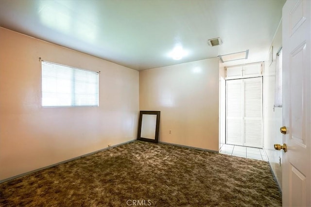 201 E Olive St, San Bernardino, CA 92410 - carpeted spare room with baseboards and visible vents
