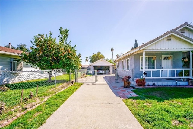 201 E Olive St, San Bernardino, CA 92410 - view of front of house with a gate, fence, covered porch, a front yard, and a garage