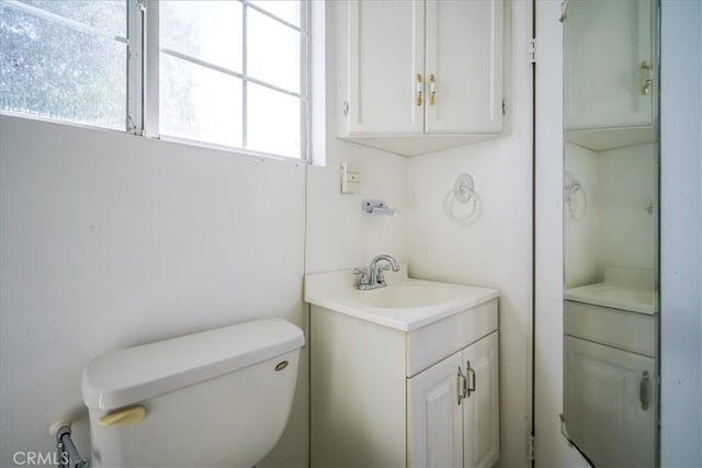 201 E Olive St, San Bernardino, CA 92410 - bathroom featuring toilet and vanity