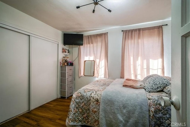 201 E Olive St, San Bernardino, CA 92410 - bedroom with dark wood finished floors and a closet