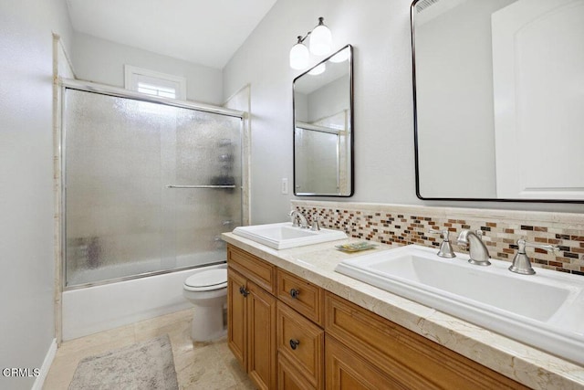 4111 Adriatic St, Oxnard, CA 93035 - bathroom with double vanity, enclosed tub / shower combo, and toilet