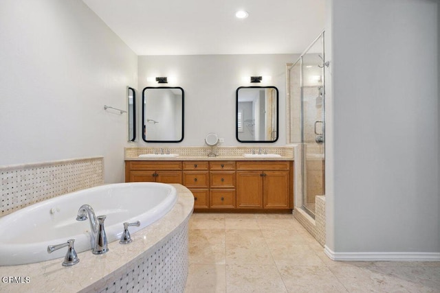 4111 Adriatic St, Oxnard, CA 93035 - bathroom featuring a bath, a shower stall, double vanity, and tile patterned floors