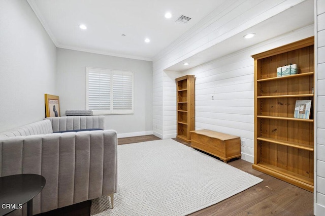 4111 Adriatic St, Oxnard, CA 93035 - sitting room with ornamental molding, wood finished floors, recessed lighting, and baseboards