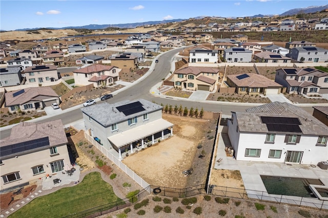 birds eye view of property with a residential view and a mountain view