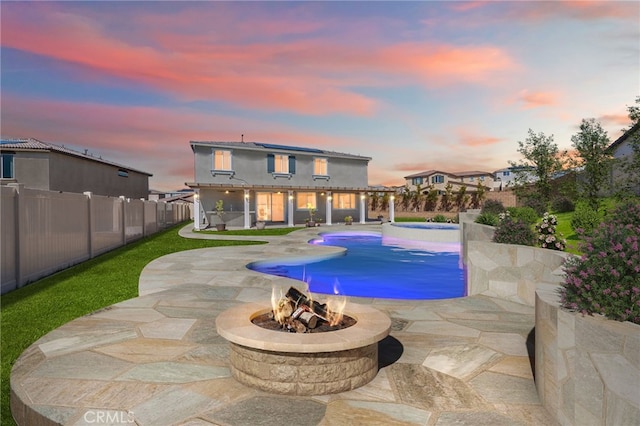 11638 Zoeller St, Beaumont, CA 92223 - view of pool with an outdoor fire pit, a fenced backyard, a patio, and an in-ground hot tub