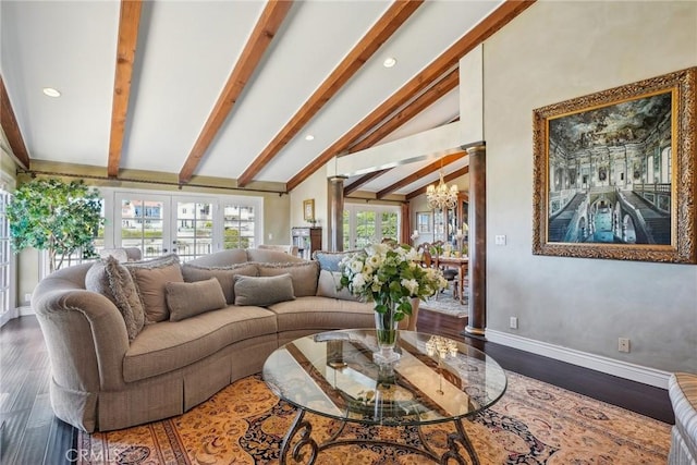 living room with a chandelier, lofted ceiling with beams, baseboards, recessed lighting, and wood finished floors