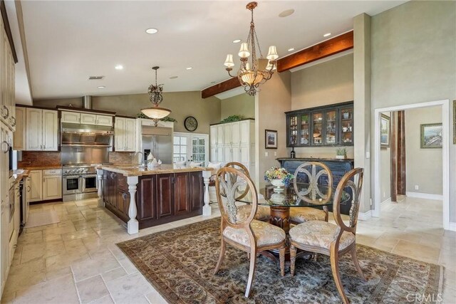 1547 Via Coronel, Palos Verdes Estates, CA 90274 - dining space featuring stone tile flooring, high vaulted ceiling, baseboards, recessed lighting, and a notable chandelier