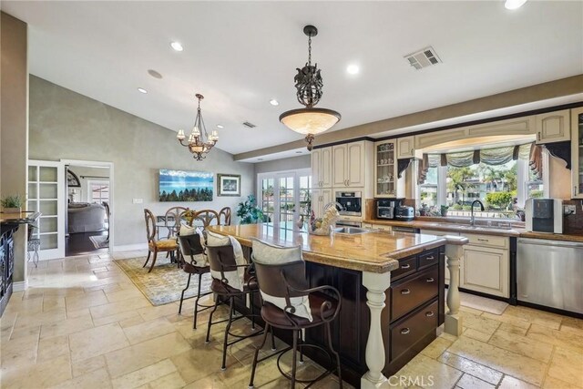 1547 Via Coronel, Palos Verdes Estates, CA 90274 - kitchen featuring stainless steel appliances, visible vents, a sink, and stone tile flooring