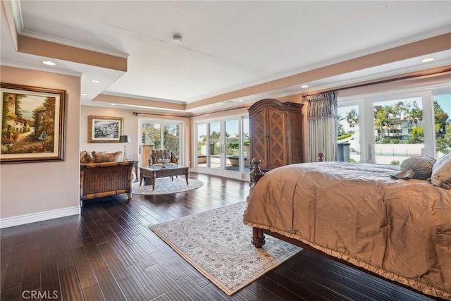 bedroom with access to outside, dark wood-style flooring, baseboards, a raised ceiling, and crown molding