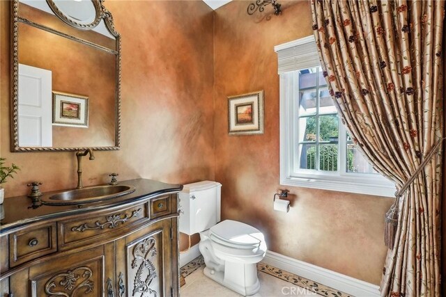 1547 Via Coronel, Palos Verdes Estates, CA 90274 - bathroom featuring toilet, baseboards, tile patterned floors, and vanity