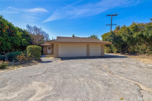 2001 Hacienda Rd, La Habra Heights, CA 90631 - view of front facade featuring a garage