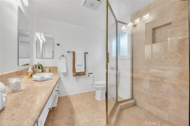 2001 Hacienda Rd, La Habra Heights, CA 90631 - bathroom featuring a shower stall, double vanity, toilet, baseboards, and tile patterned flooring