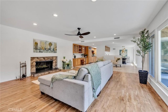 2001 Hacienda Rd, La Habra Heights, CA 90631 - living area featuring a ceiling fan, light wood-style floors, a fireplace, and recessed lighting