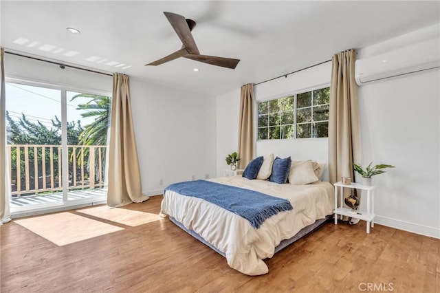 2001 Hacienda Rd, La Habra Heights, CA 90631 - bedroom featuring a wall unit AC, access to exterior, multiple windows, baseboards, and recessed lighting