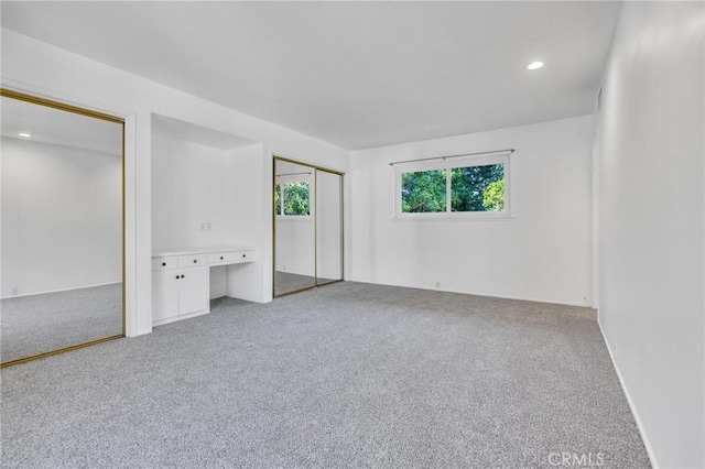 2001 Hacienda Rd, La Habra Heights, CA 90631 - unfurnished bedroom with two closets, carpet flooring, and recessed lighting