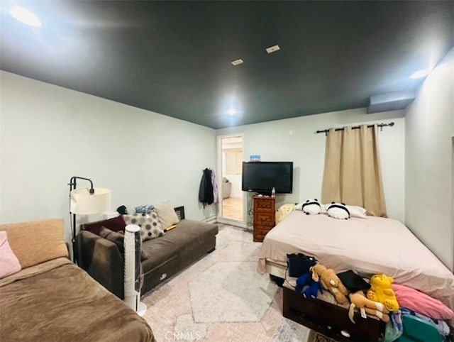 bedroom with light carpet