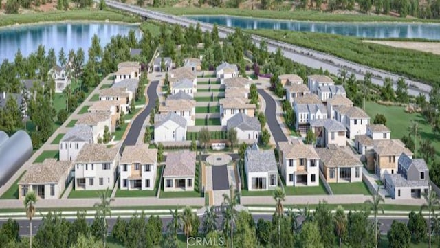aerial view with a water view and a residential view