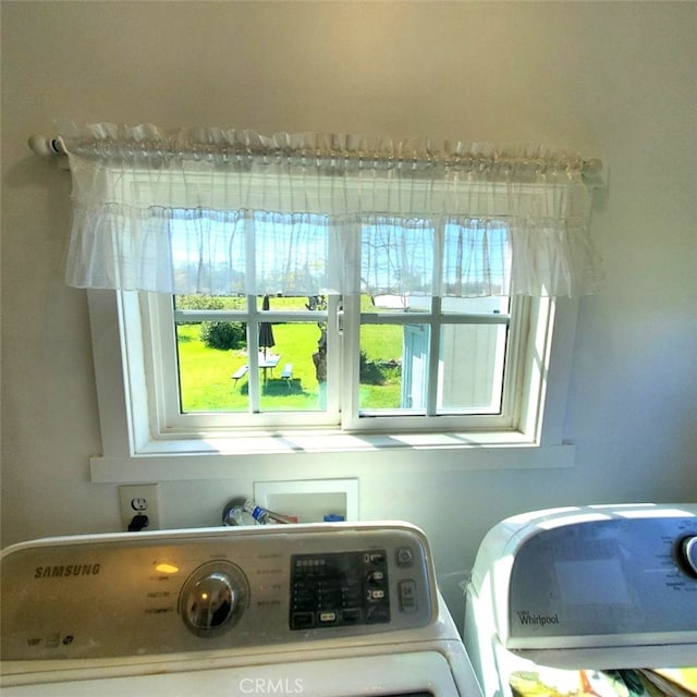laundry area featuring laundry area and washing machine and dryer