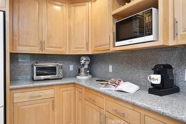 5223 Armida Dr, Woodland Hills, CA 91364 - kitchen with white microwave, light brown cabinets, and tasteful backsplash