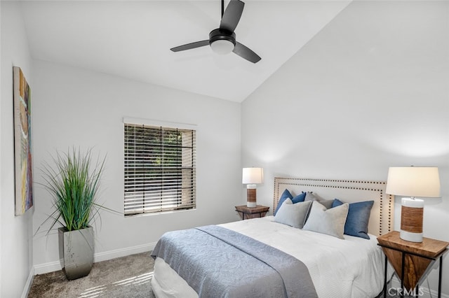 bedroom featuring vaulted ceiling, baseboards, carpet floors, and ceiling fan
