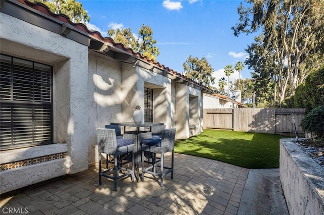 view of patio / terrace with a fenced backyard and outdoor dining space