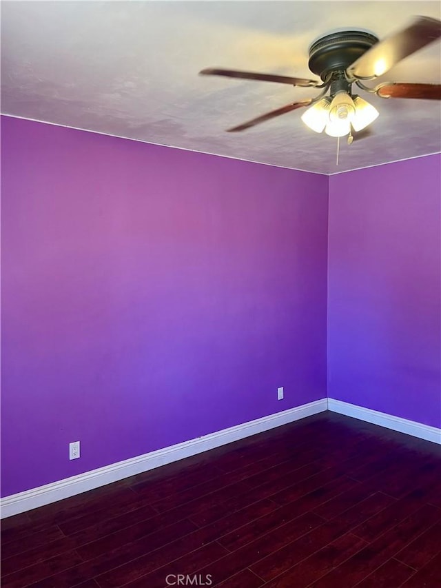 10715 3rd Ave, Hesperia, CA 92345 - empty room featuring dark wood-type flooring and a ceiling fan