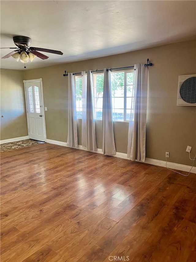 10715 3rd Ave, Hesperia, CA 92345 - foyer entrance featuring wood finished floors and ceiling fan