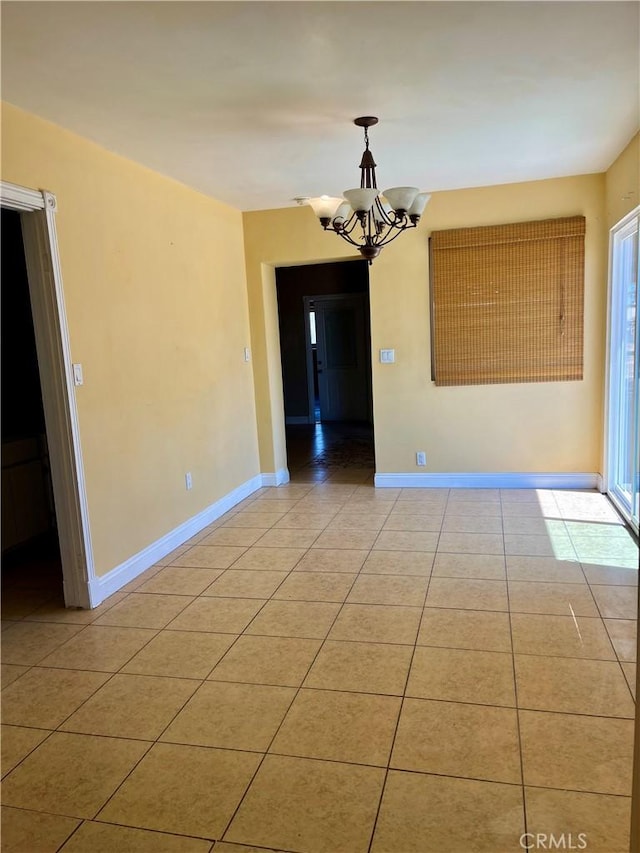 10715 3rd Ave, Hesperia, CA 92345 - empty room with a chandelier and light tile patterned floors