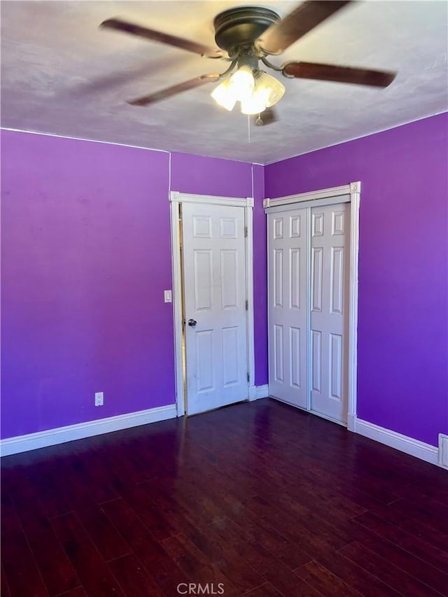 10715 3rd Ave, Hesperia, CA 92345 - unfurnished bedroom with wood finished floors, a ceiling fan, and a closet