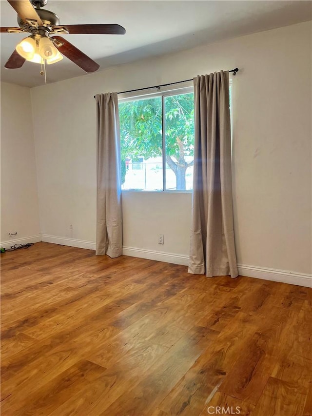 10715 3rd Ave, Hesperia, CA 92345 - unfurnished room with light wood-style floors and a ceiling fan