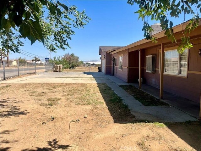 10715 3rd Ave, Hesperia, CA 92345 - view of yard featuring a patio