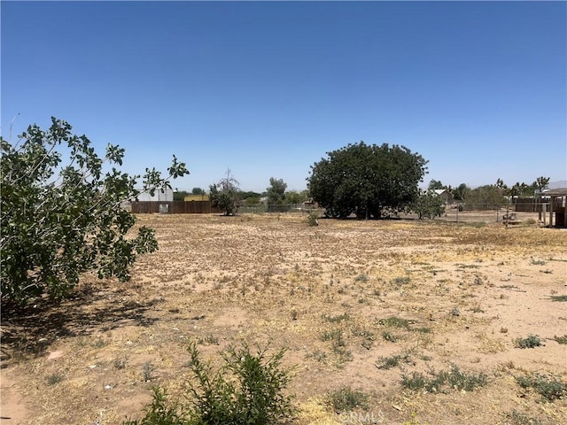10715 3rd Ave, Hesperia, CA 92345 - view of yard featuring a rural view