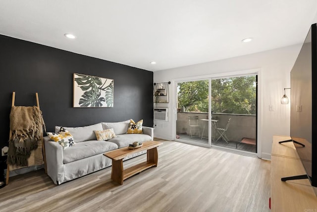 6780 Friars Rd Unit 243, San Diego, CA 92108 - living area featuring wood finished floors, recessed lighting, an accent wall, and cooling unit