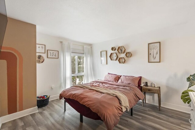 6780 Friars Rd Unit 243, San Diego, CA 92108 - bedroom with wood finished floors